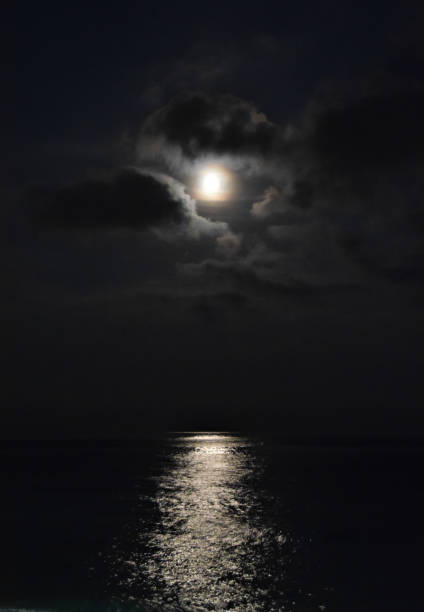 istock Full moon over the sea 1306352941