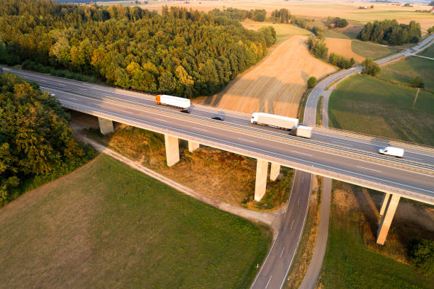 istock Highway Bridge with Traffic, Aerial View 1306354417