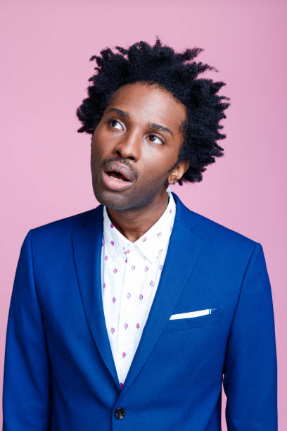 istock Portrait of confused elegant man 1306356419