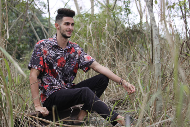 istock A young gay man enjoys the nature 1306358828