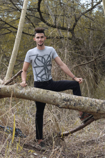 istock A young gay man enjoys the nature 1306359499