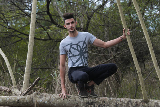 istock A young gay man enjoys the nature 1306359642