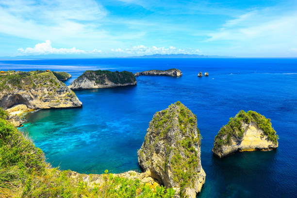 istock tropical island in Bali with blue sky 1306364473