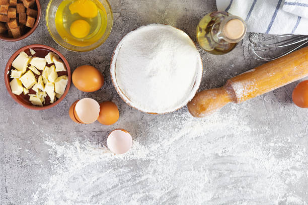 istock Flour and ingredients for making dough. Ingredients for baking pizza, bread, bakery 1306364886