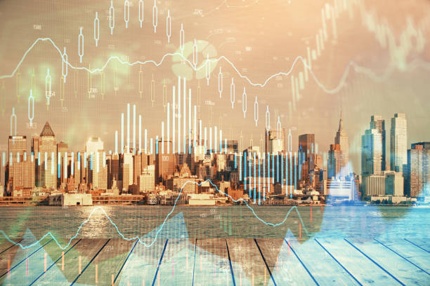 istock Forex graph on city view with skyscrapers background multi exposure. Financial analysis concept. 1306369957