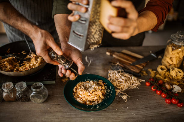 istock Grating hard cheese for best homemade pasta finish 1306372512