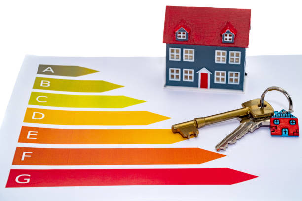 istock Energy efficiency ratings with a small house and door keys 1306372803