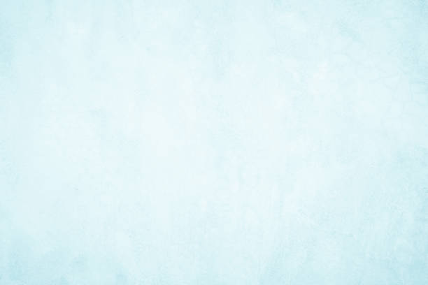 istock Pastel Blue and White concrete stone texture for background in summer wallpaper. Cement and sand wall of tone vintage. Concrete abstract wall of light cyan color, cement texture mint green for design. 1306373484
