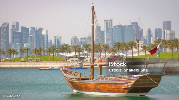 Qatar Skyline Along With Traditional Dhow Stock Photo - Download Image Now - Arabia, Architecture, Business