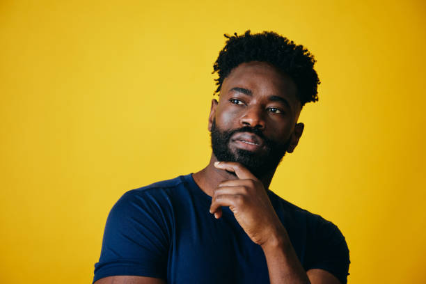 istock Thoughtful Man With Hand On Chin Looking Away 1306374055