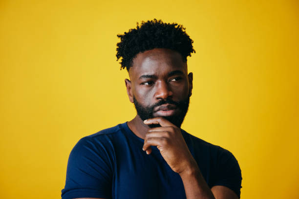 istock Thoughtful Man With Hand On Chin Looking Away 1306374057