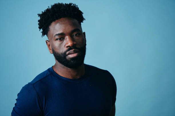 istock Handsome Man With Beard And Black Afro Hairstyle 1306374058