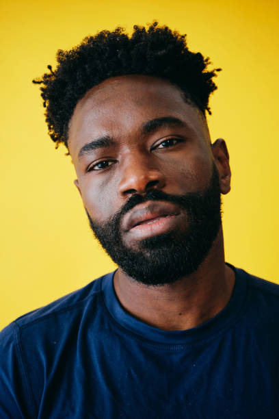 istock Handsome Man With Beard And Black Afro Hairstyle 1306374079