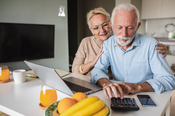istock Home finances planning for a senior couple 1306377713