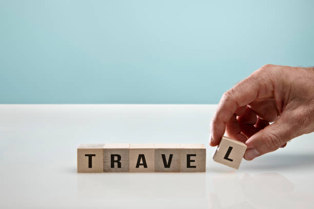 istock Blocks on Blue Background symbolizing Travel Reopening 1306378197