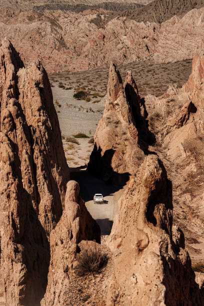 istock Pickup truck on dirt road between rock formations in Quebrada de las Flechas, Salta, Argentina 1306379085