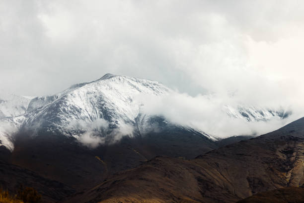 istock Snowy mountain peak with clouds in Salta, Argentina 1306379270