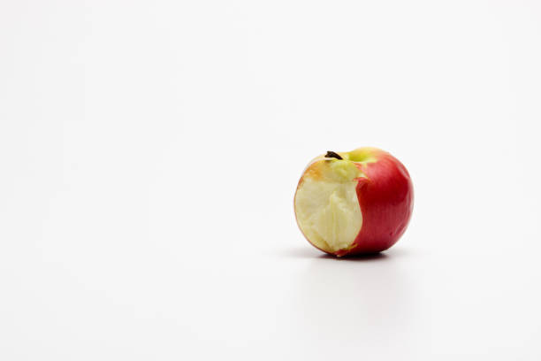 istock A ripe red apple isolated on a white background. Red bitten apple on white background. Apple Clipping Path 1306382551