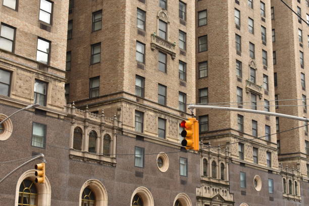 istock Side of a Skyscraper in New York City with Stoplight 1306383273