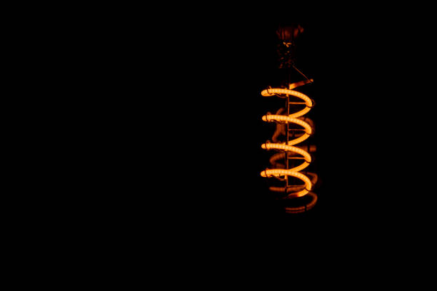 istock An shoot from below of a orange bulb glowing 1306383347
