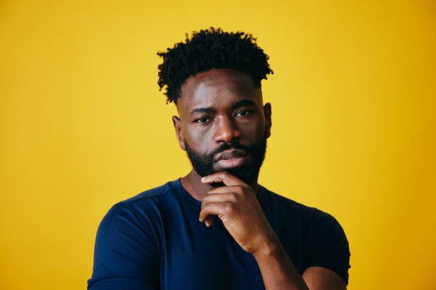 istock Thoughtful Man With Hand On Chin Looking Away 1306384721