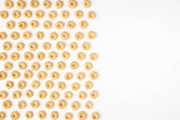 Breakfast cereal isolated on white background. Whole weat circular cereal cheerios.