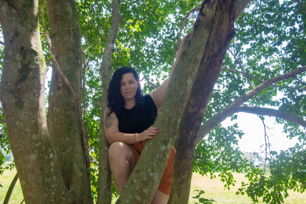 istock mature woman on the tree 1306388398