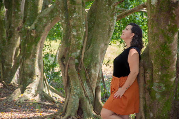 istock mature woman on the tree 1306388469