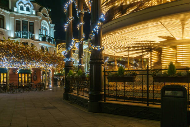 istock Long exposure of a carousel at night 1306389211