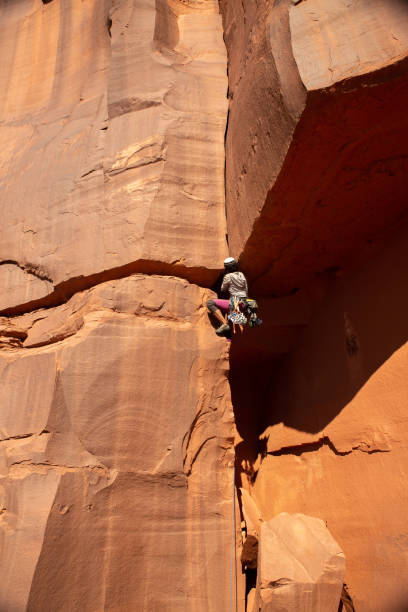 istock Female Rock Climber on large sandstone climb 1306392862