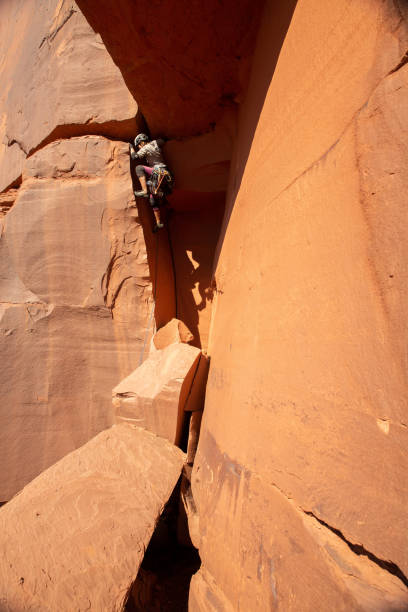 istock Female Rock Climber on large sandstone climb 1306392865