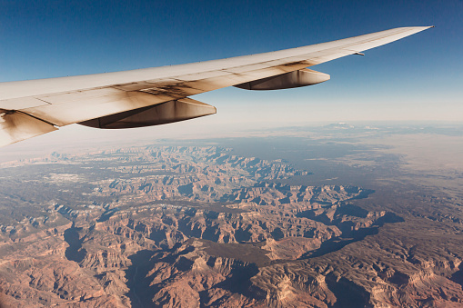 Airplane wing over landscape view of Grand Canyon Arizona in Grand Canyon Village, AZ, United States
