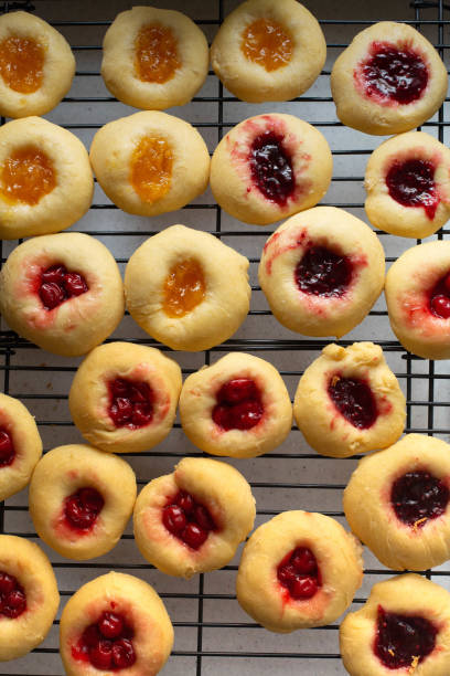 Homemade koclache filled with cherries, raspberries, and apricots Homemade koclache filled with cherries, raspberries, and apricots in Oak Park, IL, United States kolache stock pictures, royalty-free photos & images