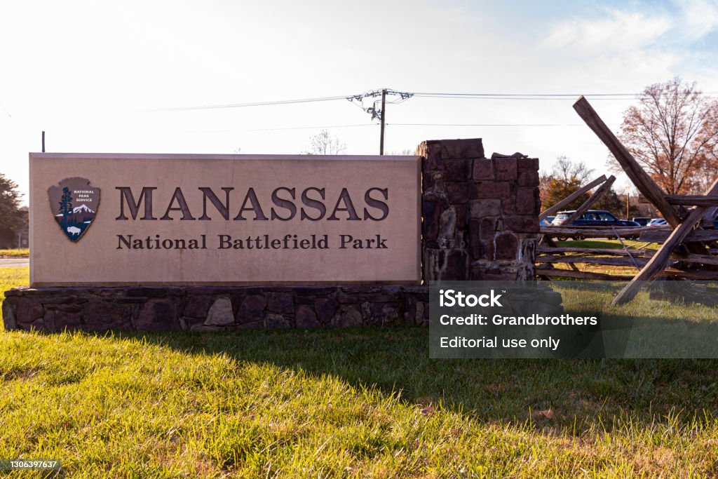 Virginia Manassas National Battlefield Park located at the site of the bloody Bull Run battles Manassas, VA, USA 11-14-2020: Virginia Manassas National Battlefield Park located at the site of the bloody Bull Run battles between union and confederate armies during Civil war. There are wooden picket fences near the sign. Civil War Stock Photo