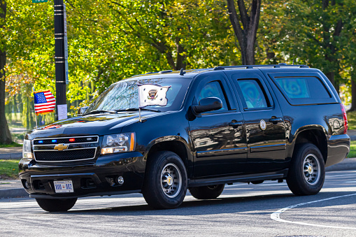 Washington DC, USA 11-06-2020: Armor plated Chevrolet Suburban with US presidential seal and 800 002 license plate used by presidential motorcade is cruising in Constitution Avenue near White House.