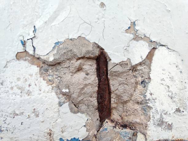 istock The cement cracks until the steel bar is seen rusting inside. 1306399461