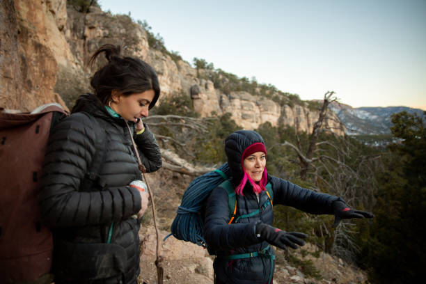 istock Two women chat while leaving the climbing area 1306399711