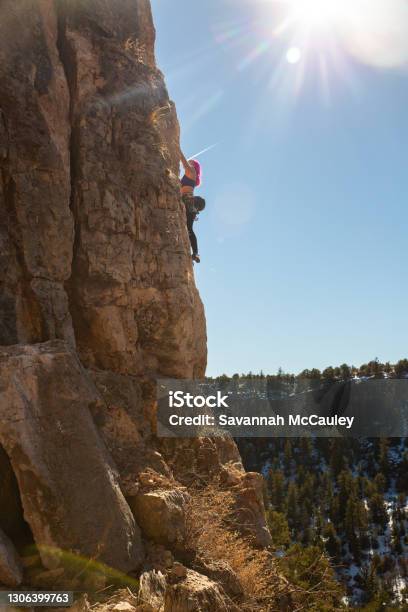 Female Climber Works Up Side Of Climbing Arete Stock Photo - Download Image Now - Colorado, Rocky Mountains - North America, 25-29 Years
