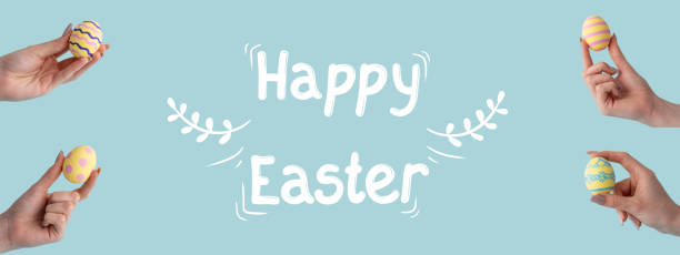 happy easter holiday greeting painted egg in hand - easter text single word paint imagens e fotografias de stock