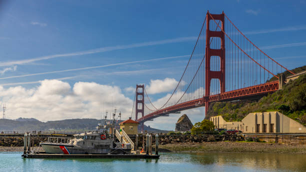 Rescue boats under the Golden Gate U.S. Coast Guard Golden Gate station at Fort Baker under the Golden Gate Bridge sausalito stock pictures, royalty-free photos & images