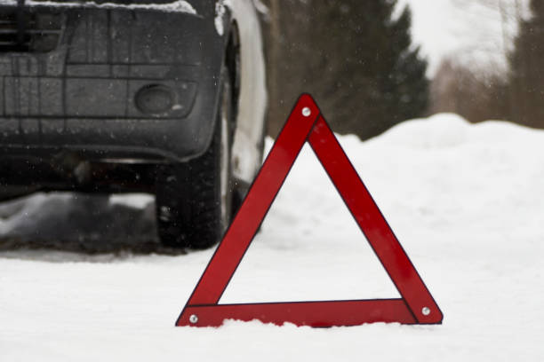 istock Car with a breakdown on snowy road. Winter driving 1306411064