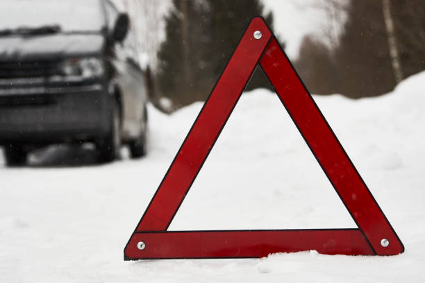 istock Car with a breakdown on snowy road. Winter driving 1306411066