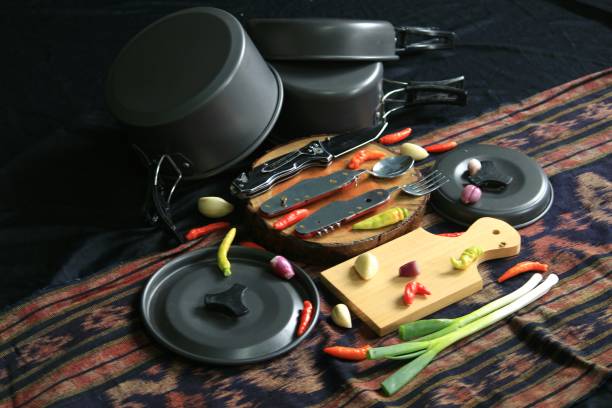 istock pans, knives, cooking utensils and kitchen ingredients such as chilies, shallots, garlic. 1306411893