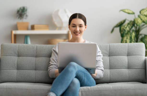 istock woman resting on sofa at home 1306413465