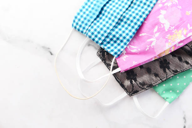 istock homemade face masks on tiles background top down 1306414512