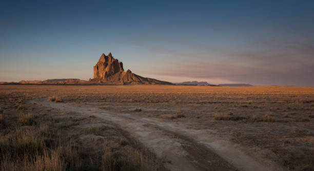 istock Shiprock at sunrise, New Mexico, USA 1306415916