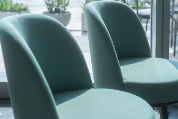 istock closeup armchair upholstery arrange setting in cafe restaurant with sun light from window side interior furniture design concept 1306416517