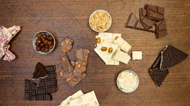 istock many different types of chocolate lie on a brown background