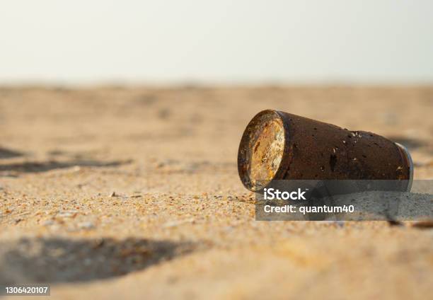 Old Rusty Can Dropped On The Sand Beach Stock Photo - Download Image Now - Abandoned, Aging Process, Antique