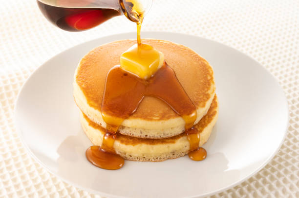 istock Sprinkle plenty of maple syrup on the pancakes 1306420256